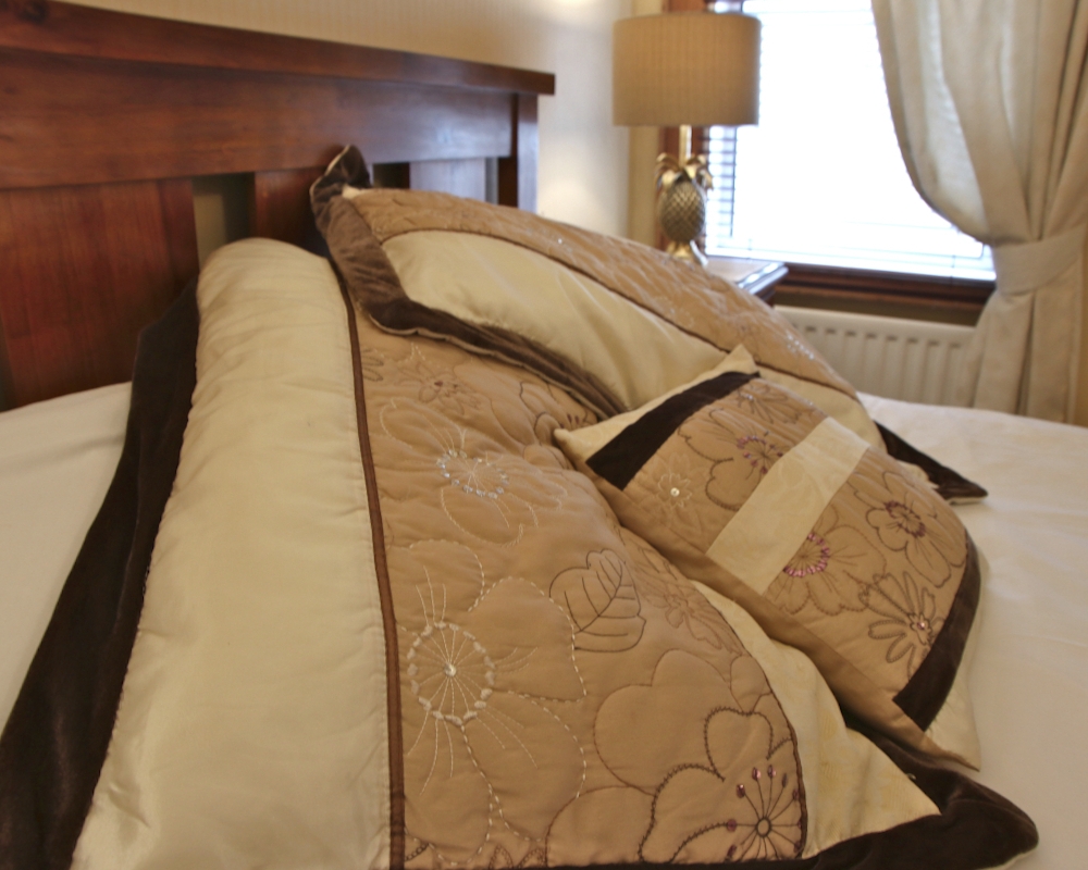 Our larger bedroom Our larger bedroom